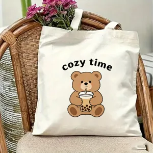 Cute cartoon bear print canvas tote bag, casual shoulder bag for daily travel and shopping use.