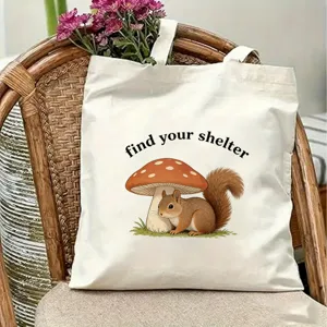 Detailed view of white canvas tote bag featuring cute squirrel and mushroom print, ideal use.