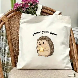 Cute hedgehog printed canvas tote bag, versatile casual shoulder bag for daily travel use.