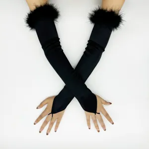 Black long satin fingerless gloves with fluffy feather trim, 1920s vintage costume party.
