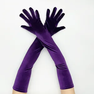 Close-up detail of long purple velvet opera gloves, elegant texture for evening parties.