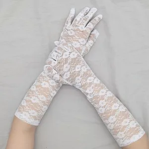 Close-up of white lace long gloves, showcasing intricate floral patterns and elegant design.