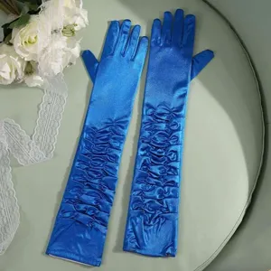 Detailed view of long royal blue satin ruched gloves closeup, elegant wedding apparel accessory.