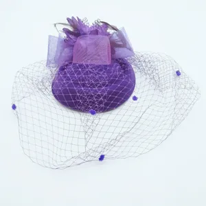 Purple mesh vintage feather mini fascinator hat detail for 1920s tea party wedding bride.