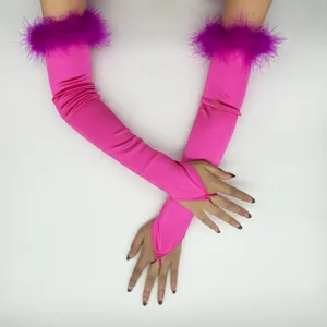Hot pink satin fingerless long gloves featuring vibrant purple feather trim, vintage party style.