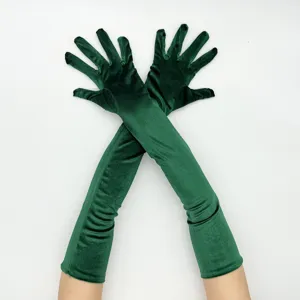 Dark green velvet long gloves detail, elegant retro 1920s style evening party costume accessory.