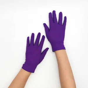 Detailed view of women purple stretch milk silk short gloves, perfect for performance and sun.
