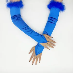 Detail view of blue satin long gloves featuring fluffy feather cuffs and finger loop design.