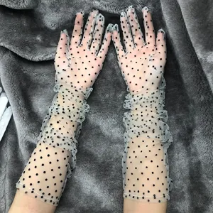 Women summer sheer mesh sun protection long gloves with black polka dots for driving outdoor.