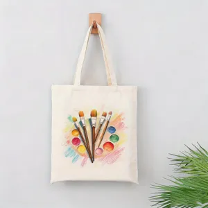Bolso tote de lona con arte de pincel colorido y paleta, ideal para viajes y uso diario.