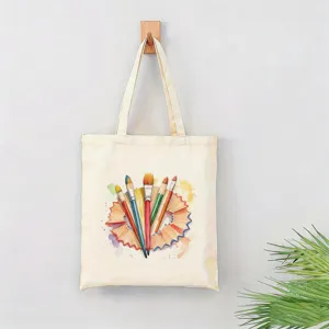 Bolsa de lona con diseño de pinceles de acuarela, ideal para uso diario y amantes del arte.