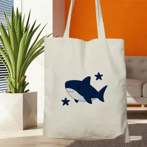 Beigefarbene Canvas Tragetasche mit süßem Cartoon Hai Print, lässige Handtasche für Reisen.
