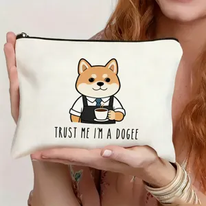 Close up of canvas cosmetic bag detail, featuring cute shiba inu coffee print design.