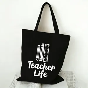 Schwarze Stofftasche aus Canvas mit Lehrer Print, grosser Shopper fuer den Alltag.