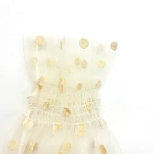Sheer mesh polka dot ruffled cuffs, elastic smocked wrist sleeve party costume accessory.