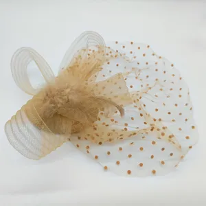 Exquisite champagne mesh feather fascinator detail, vintage 1920s style hair accessory close up.