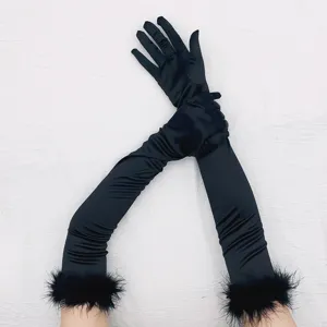 Long black satin gloves with faux fur cuffs, vintage 1920s style detail for party and cosplay.