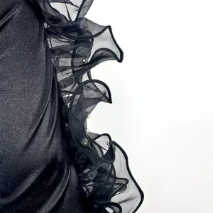Black satin and sheer organza ruffle detail with pearl embellishment for 1920s vintage dress.