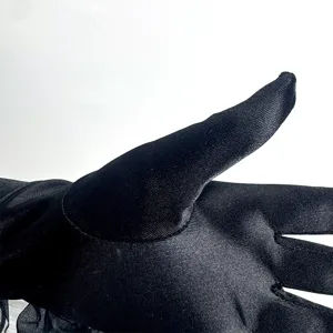 Black satin gloves detail women 1920s vintage evening party costume accessories close-up