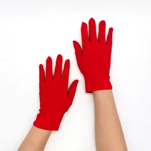 Women short red milk silk stretch gloves detailed view showing soft fabric and fit.