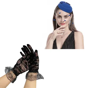 Detailed view of elegant black lace gloves and blue fascinator hat, exquisite lace trim.