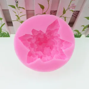 Pink silicone flower mold for fondant, chocolate, and resin crafts baking tool details.