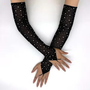 Black mesh rhinestone long gloves detail view, elastic sparkly fingerless tulle fashion accessory.