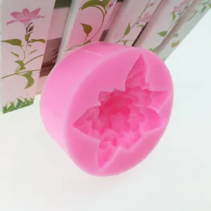 Close-up of the pink silicone mold detail, showing intricate flower cavity design for DIY craft.