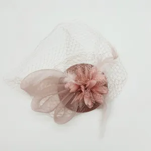 Pink feather mesh fascinator detail shot showing delicate floral accent for 1920s party wear.