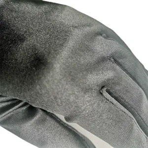 Black satin evening gloves detail shot, elegant bridal wedding accessories smooth fabric.