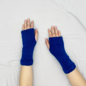 Knit fingerless gloves detail showcasing soft plush texture for autumn and winter warmth.