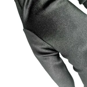 Close-up detail view of black satin glove showing exquisite texture and fine stitching design.