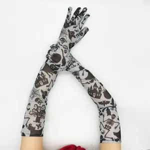 Halloween long mesh gloves detail shot, showcasing gothic skeleton and castle printed patterns.