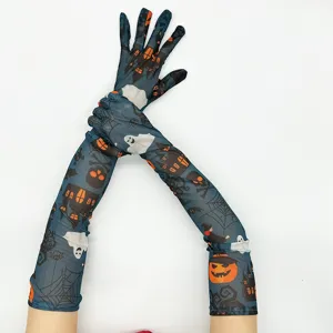 Close-up of Halloween mesh long gloves featuring spooky ghost and pumpkin prints for party.