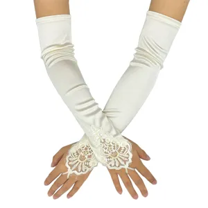 Elegant white satin fingerless gloves with floral lace appliques for wedding parties.