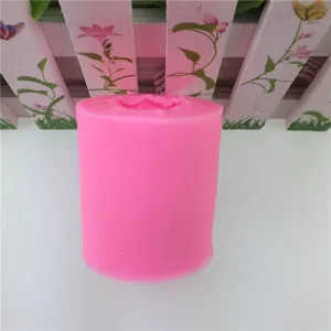 Close-up of the pink cylindrical silicone mold, featuring flexible texture for easy crafting.