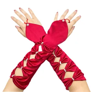 Red satin fingerless bridal gloves with bow cutout and pearl decor for wedding dress.