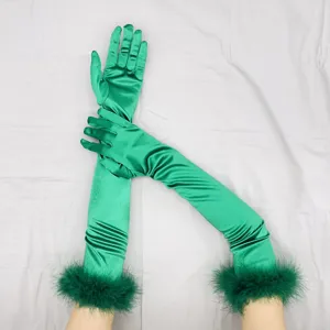 Long green satin gloves with feather cuffs, elegant 1920s retro party costume accessory.