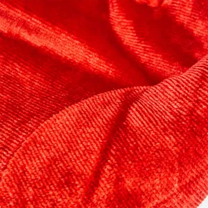 Red stretch gold velvet gloves fabric detail close-up winter warm costume accessories