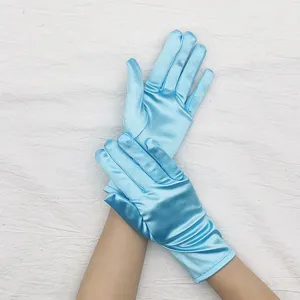 Close-up detail of light blue satin gloves, soft stretchy fabric for evening party wear.