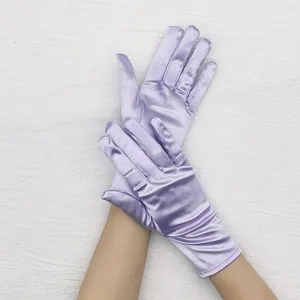 Close-up detail of short lavender satin stretch gloves, smooth texture for elegant evening wear.