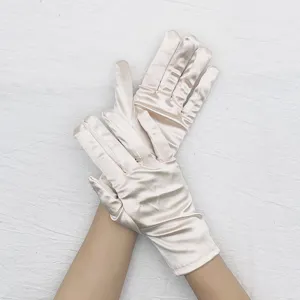 Close-up detail view of the short stretch satin gloves showing smooth fabric texture and fit.