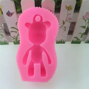Pink silicone mold for resin epoxy DIY, cute bear pendant shape with hanging hole for crafts.