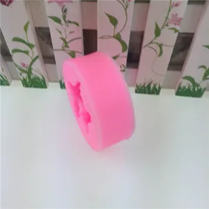 Pink silicone fondant mold for cake decorating and chocolate baking tool details.