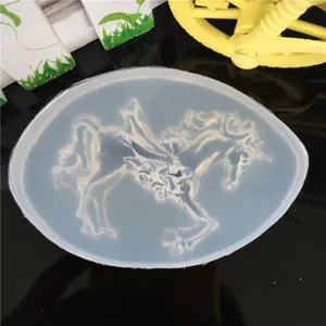 Clear silicone mold with flying horse unicorn design for DIY epoxy resin craft handmade phone case tools.