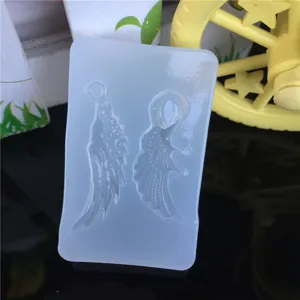Silicone wing earring mold for UV resin and epoxy casting, mini DIY jewelry making tool.