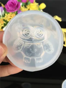 Clear silicone mold featuring a cute owl design, ideal for DIY epoxy resin crafts and accessories.