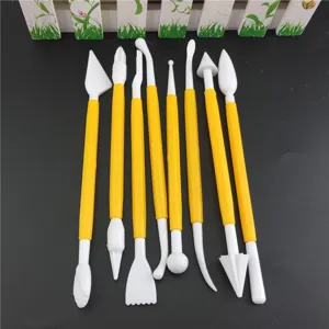 Detailed view of 8-piece DIY fondant cake decorating carving tools set with yellow handles.
