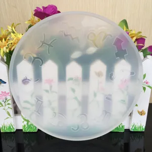 Round silicone clock mold with zodiac signs for epoxy resin casting and DIY craft making.
