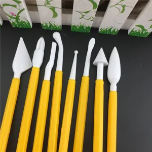 8-piece DIY fondant cake decorating tool set with yellow handles and white modeling sculpting heads.